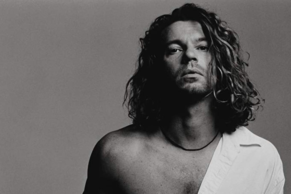 Michael Hutchence’s last years were turbulent and complicated, which his sister, in her new book, blames partly on a brain injury the Australian rock musician suffered in 1992.