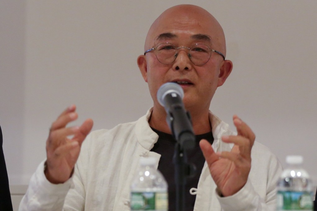 The Chinese author-in-exile Liao Yiwu speaking in New York on Wednesday. Photo: Reuters