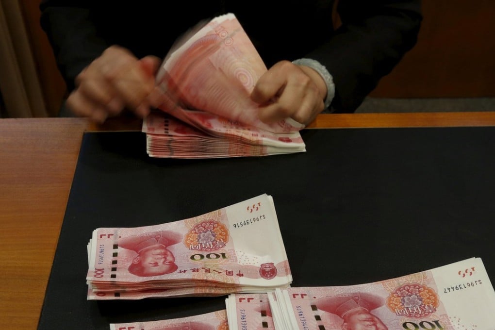 The onshore yuan dropped by 3.95 per cent against the US dollar in the third quarter. Photo: Reuters