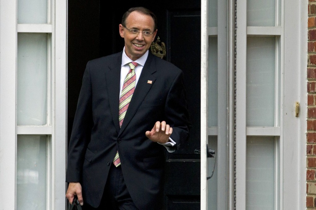 Deputy Attorney General Rod Rosenstein leaves his home on Thursday. Photo: AP