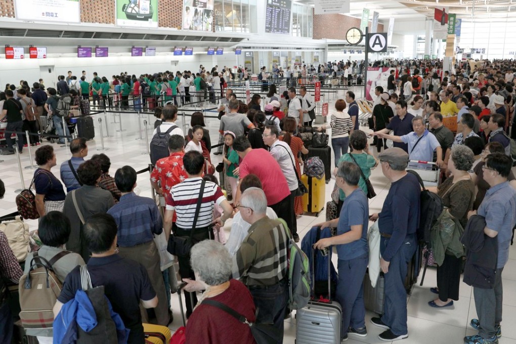 Tourists flock to the New Chitose Airport in Sapporo, Japan, on September 8 as the main gateway to the island of Hokkaido resumed international flights two days after a magnitude 6.7 earthquake struck the area. Photo: Kyodo