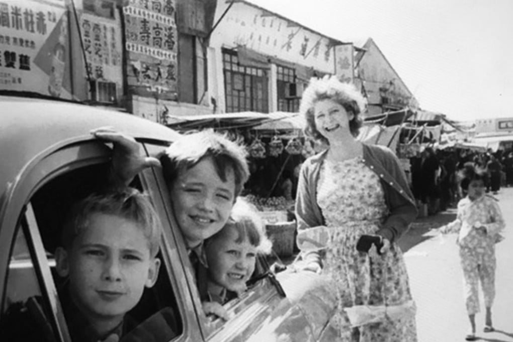 Sarah Driver, then Whitehead, and her brothers in Stanley Market. Picture: Sarah Driver