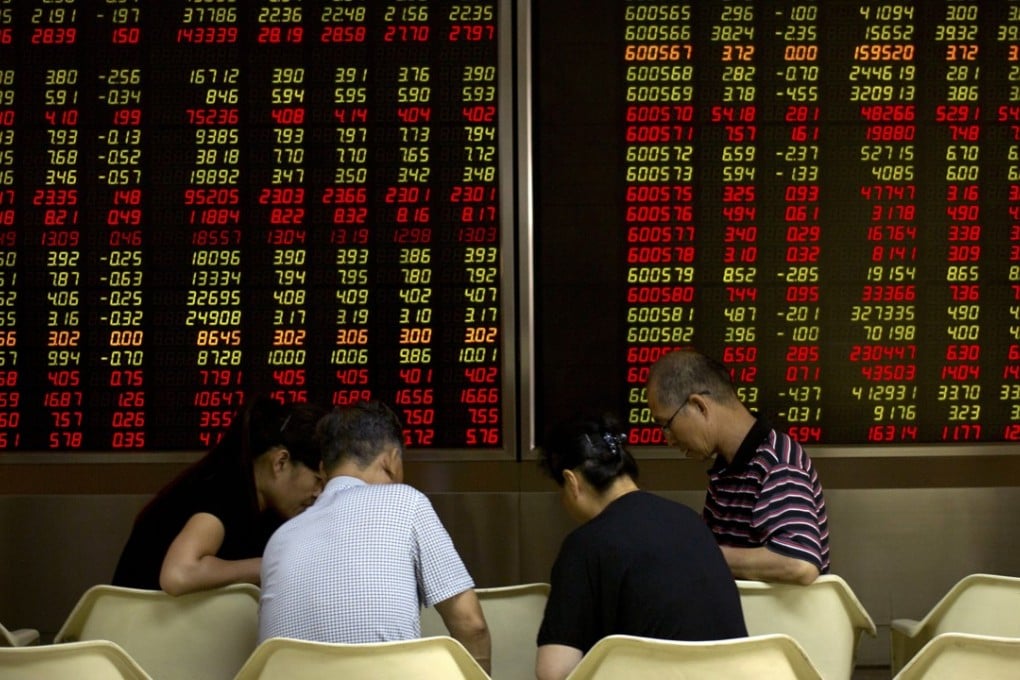 China will continue to open up its financial markets to foreign firms but the process must be gradual, a top official said. Photo: AP