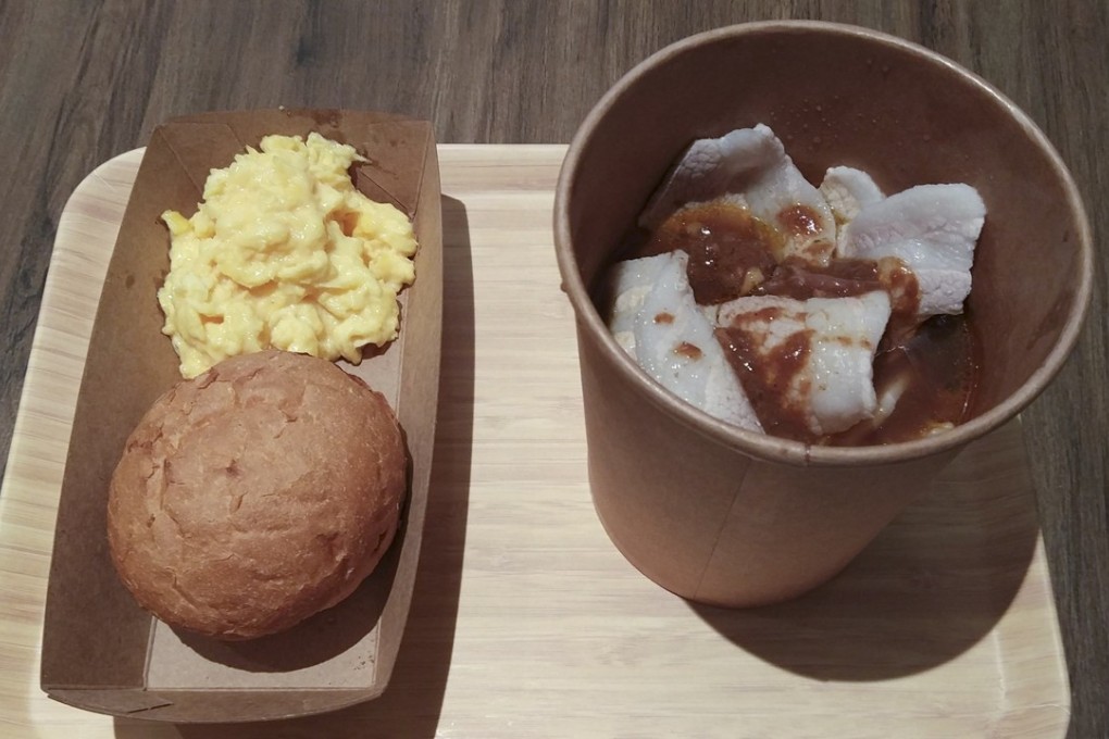 Scrambled egg and a bun, with satay pork and instant noodles, at Mao Mao Eat in Tai Kwun, Central. Photo: SCMP