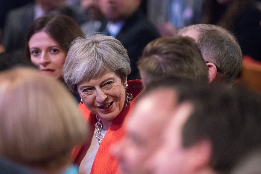 Theresa May, UK prime minister, reacts as she sits in audience during the Conservative Party annual conference in Birmingham, UK, on Sunday, September 30, 2018. May is battling to assert her authority as UK prime minister after a disastrous start to her party’s annual conference threatened to explode into a full-blown leadership crisis. Photographer: Chris Ratcliffe/Bloomberg