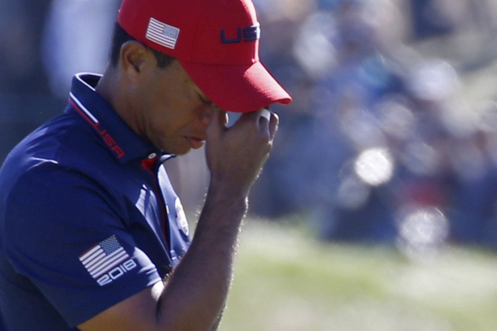 Tiger Woods cannot stop Jon Rahm in the Ryder Cup singles. Photo: Reuters