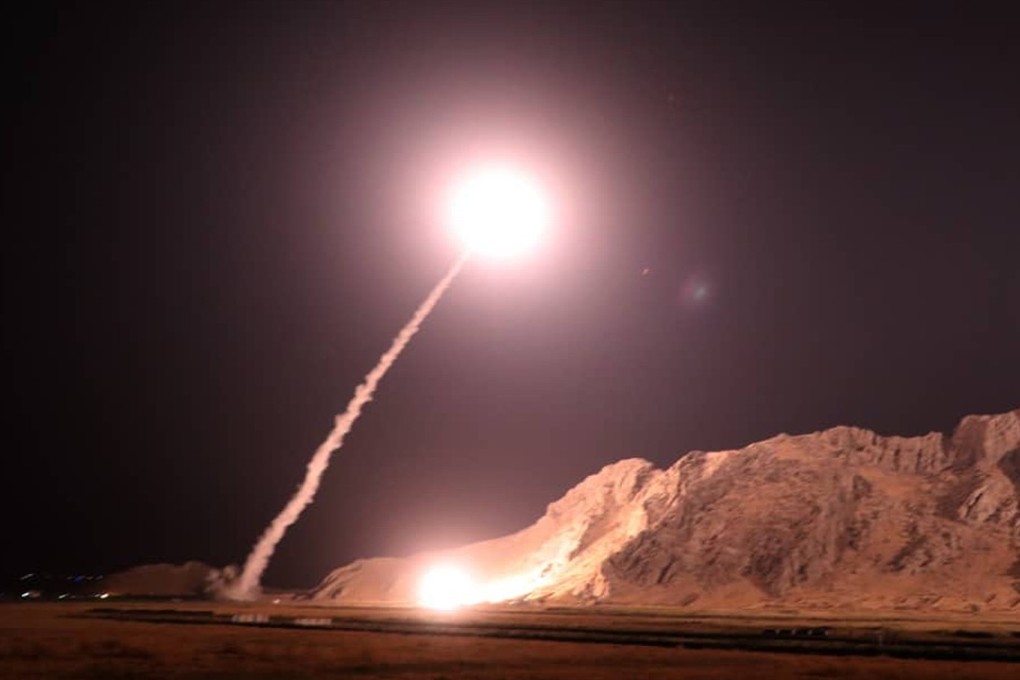 This handout photo provided by Iran's Revolutionary Guard official website shows a missile being launched at militants in eastern Syria. Photo: AFP