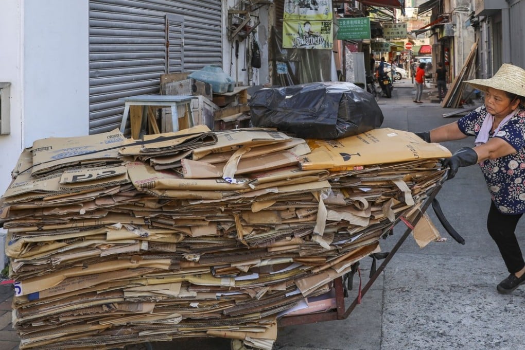 An elderly Hong Kong woman makes ends meet collecting cardboard in Sheung Shui in the New Territories. Photo: Sam Tsang