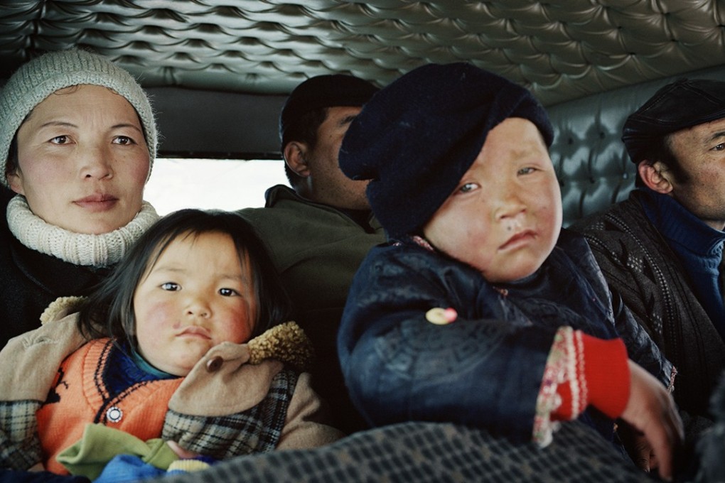 A family evacuates their home in Tsengel village, Bayan-Ölgii province, after a snowstorm in 2004. Pictures: Frédéric Lagrange