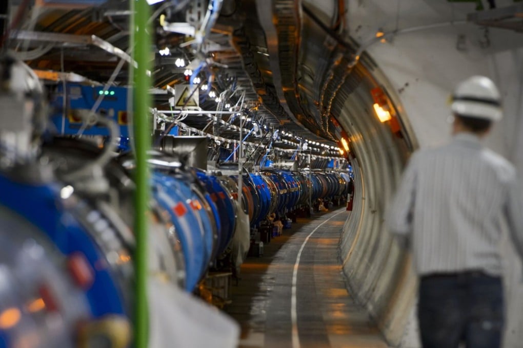 A scientist walks in a tunnel inside the European Organisation for Nuclear Research (CERN) Large Hadron Collider (LHC). File photo: AFP