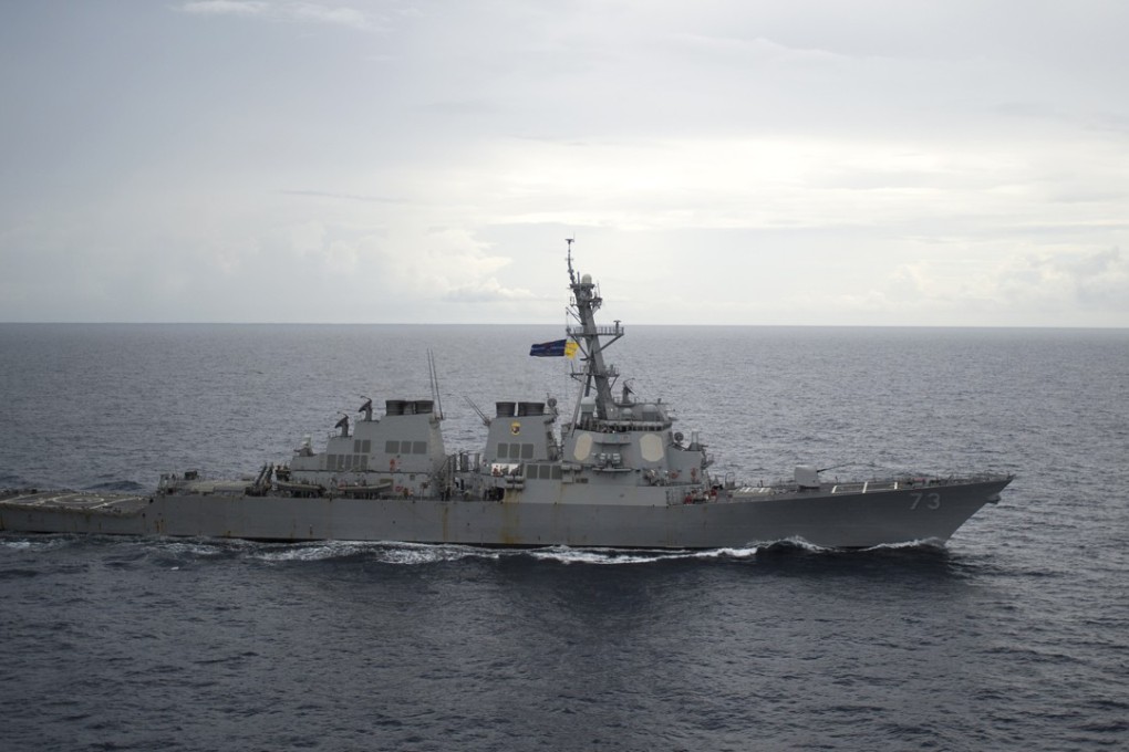 The USS Decatur passed through waters off the disputed Spratly Islands on Sunday, sailing within 12 nautical miles of the Gaven and Johnson reefs during a 10-hour patrol. Photo: AFP