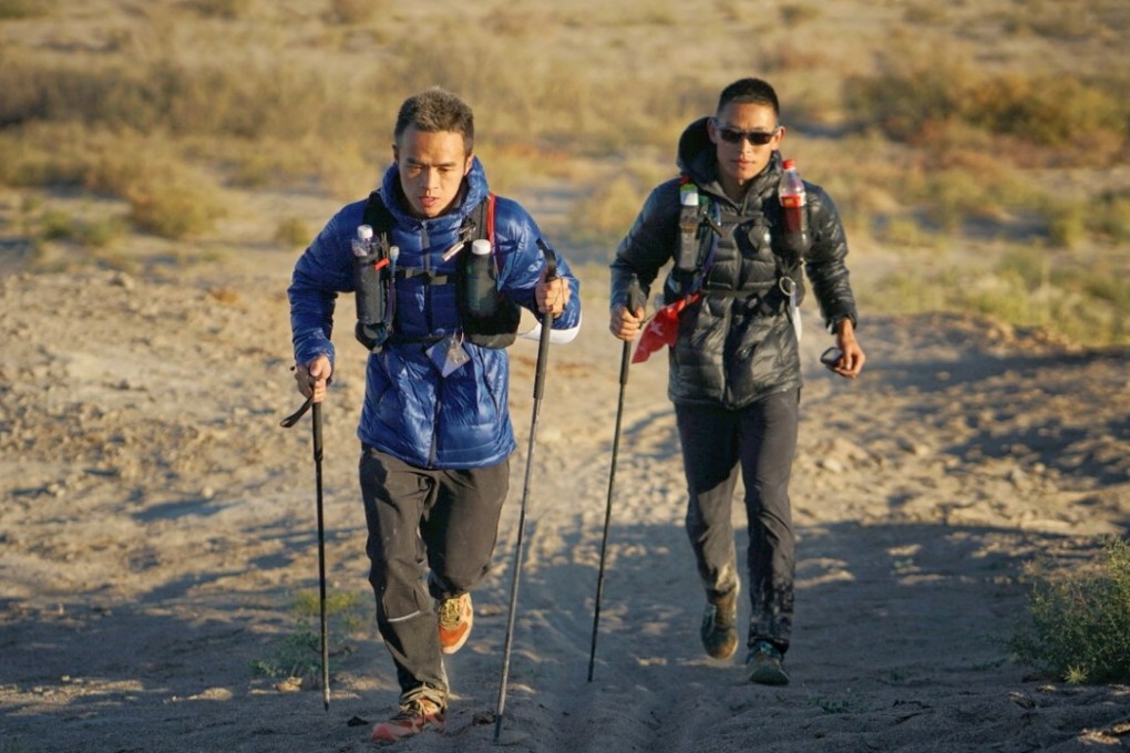 Liang Jing (left) and Zhou Jiaju battle it out at the Ultra Gobi 400km race. Photo: Lloyd Belcher Visuals