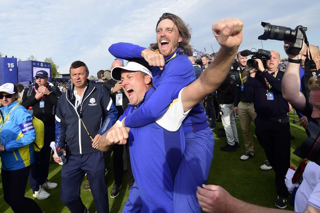 England’s Ian Poulter (left) and Tommy Fleetwood celebrate Europe winning the 2018 Ryder Cup, on the final day of the competition on September 30 at The Golf National in Guyancourt, near Paris, France. Photo: EPA-EFE