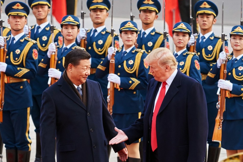 Chinese President Xi Jinping and US President Donald Trump shake hands last November during Trump’s visit to Beijing. Photo: TNS