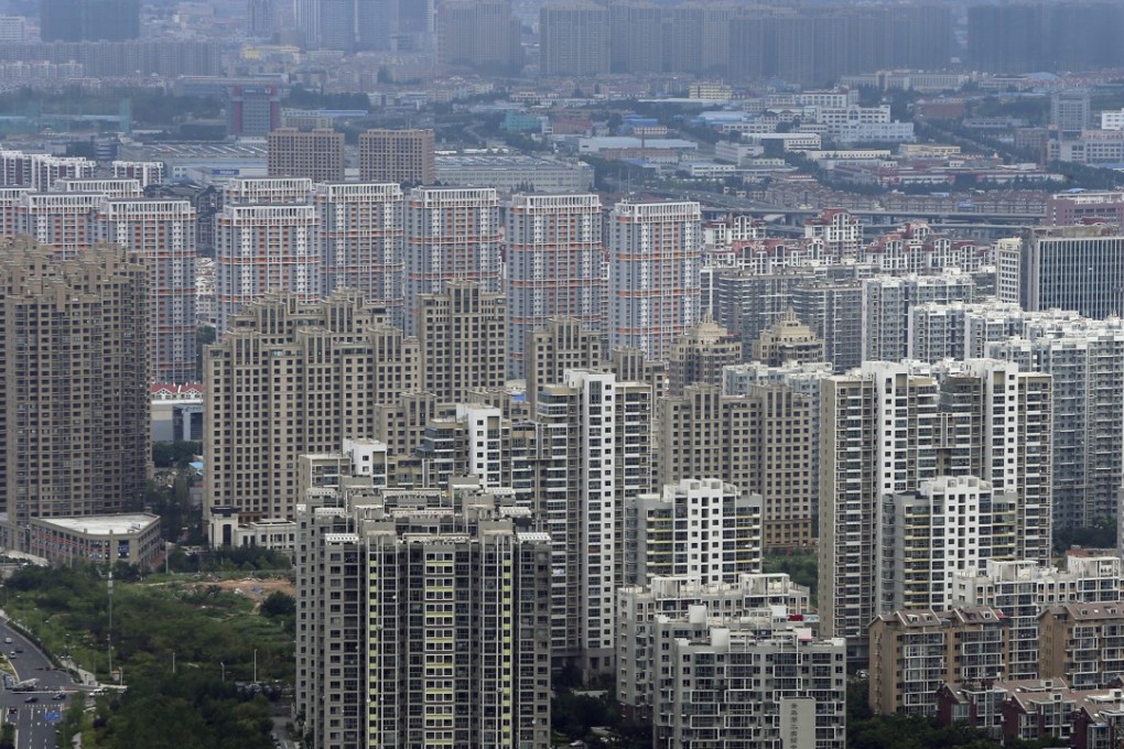 Sellers of second-hand homes in Qingdao city in Shandong province are aggressively lowering their prices to stay competitive. Above, Qingdao in a photograph taken in 2014. Photo: EPA