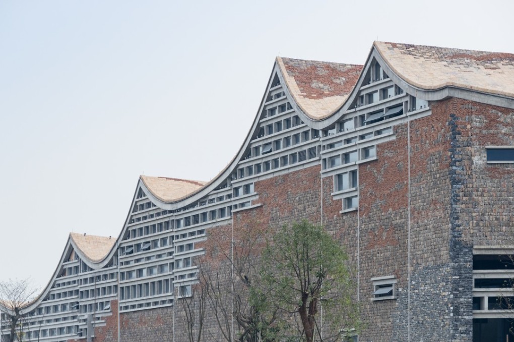 The Fuyang Cultural Complex near Hangzhou was inspired by landscapes. Comprising a history museum, archive and gallery, the building supports an undulating, wave-like roof that mirrors the rise and fall of distant hills.