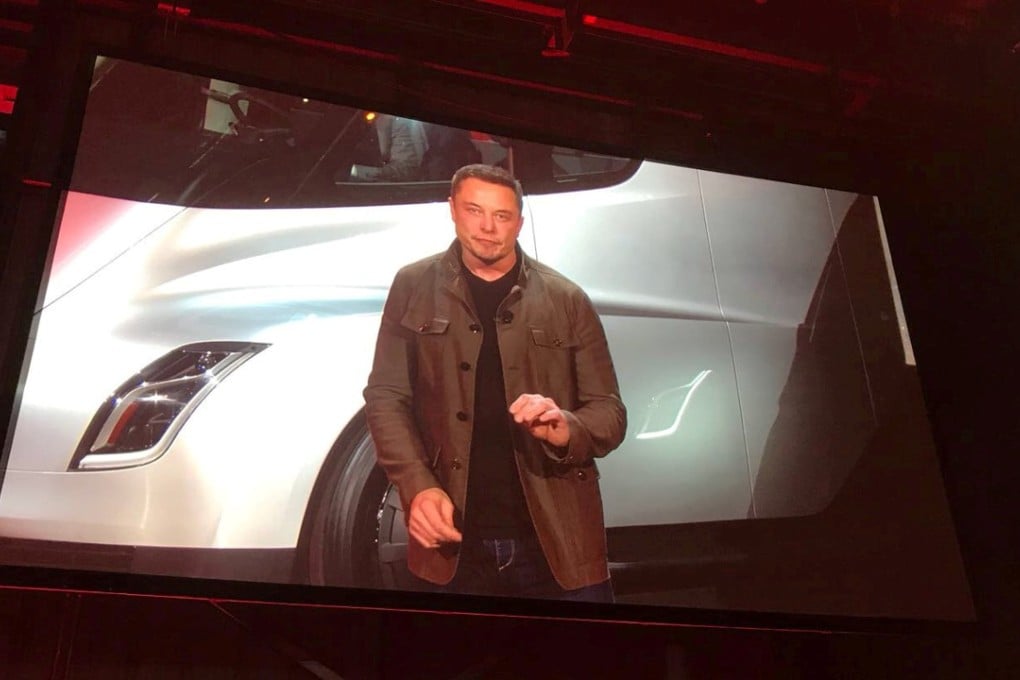 Tesla CEO Elon Musk appears on screen as he unveils the company’s new electric semi truck during a presentation in California, in November last year. It seems pretty certain that Tesla would not even exist were it not for Musk. Photo: Reuters