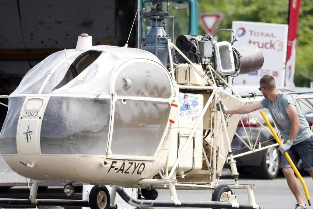 The helicopter abandoned by notorious French criminal Redoine Faid after his escape from a prison. Photo: EPA