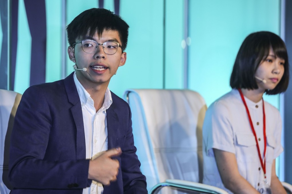 Joshua Wong Chi-fung, secretary general of Demosisto, speaks at The Economist's Open Future Festival at PMQ in Central, alongside party member Agnes Chow. Photo: Xiaomei Chen
