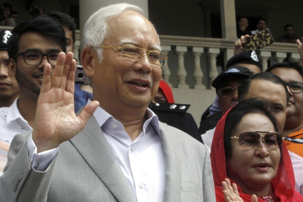 Former Malaysian prime minister Najib Razak and his wife, Rosmah Mansor. Photo: AP