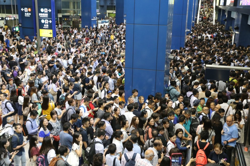Commuters were stranded for hours at Tai Wai MTR Station on the morning of September 17, a day after Typhoon Mangkhut hit Hong Kong. Photo: Felix Wong