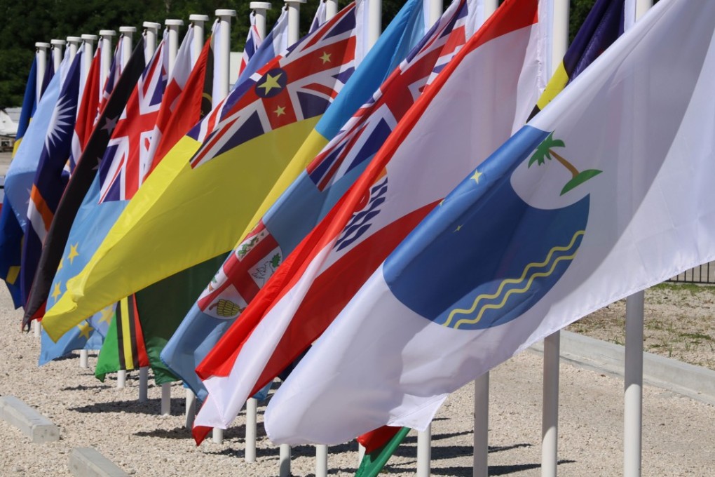 Flags of the Pacific Islands countries are displayed in Yaren, Nauru, on the last day of the Pacific Islands Forum on September 5. Putting on one side Australia and New Zealand, which account for about 97 per cent of the GDP of the grouping, the Pacific Islands Forum clusters a further 16 of the tiniest and least-noticed economies in the world. Photo: AFP