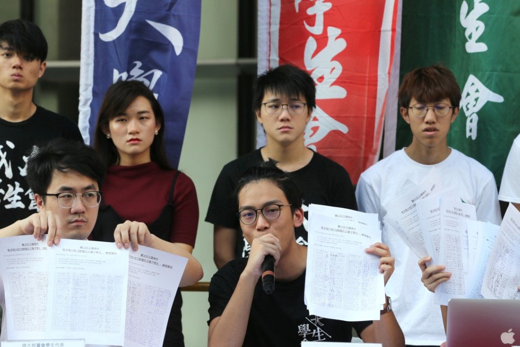 Polytechnic University student union president Lam Wing-hang (centre). Photo: Sam Tsang