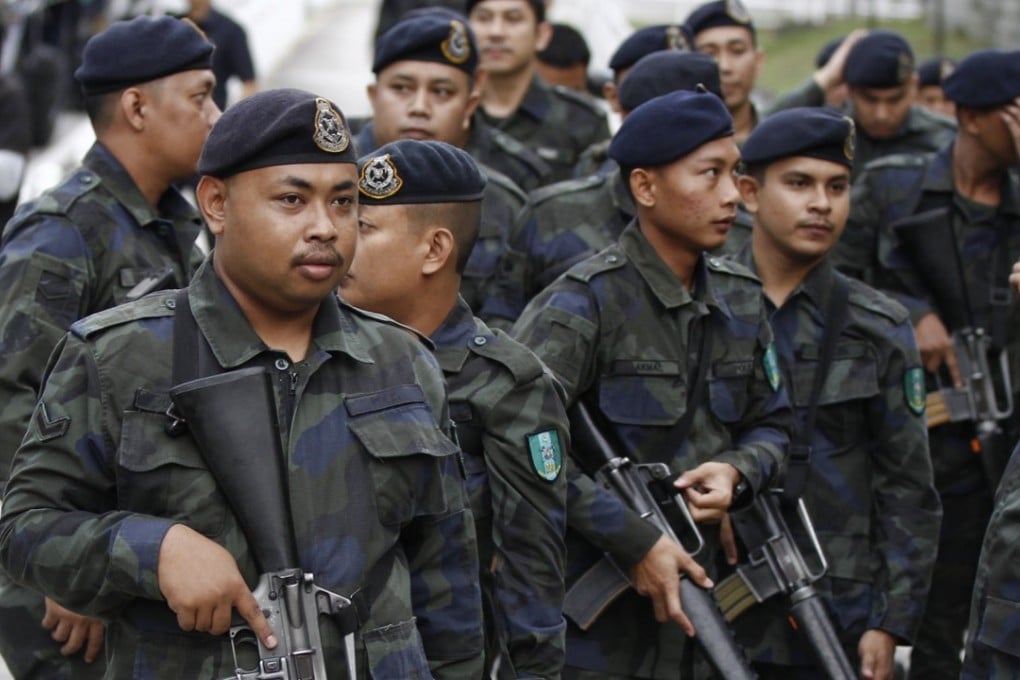 Malaysian police officers. Photo: AP