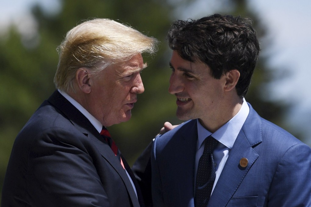 US President Donald Trump and Canadian Prime Minister Justin Trudeau at the G7 summit in Charlevoix, Canada in June. Photo: EPA