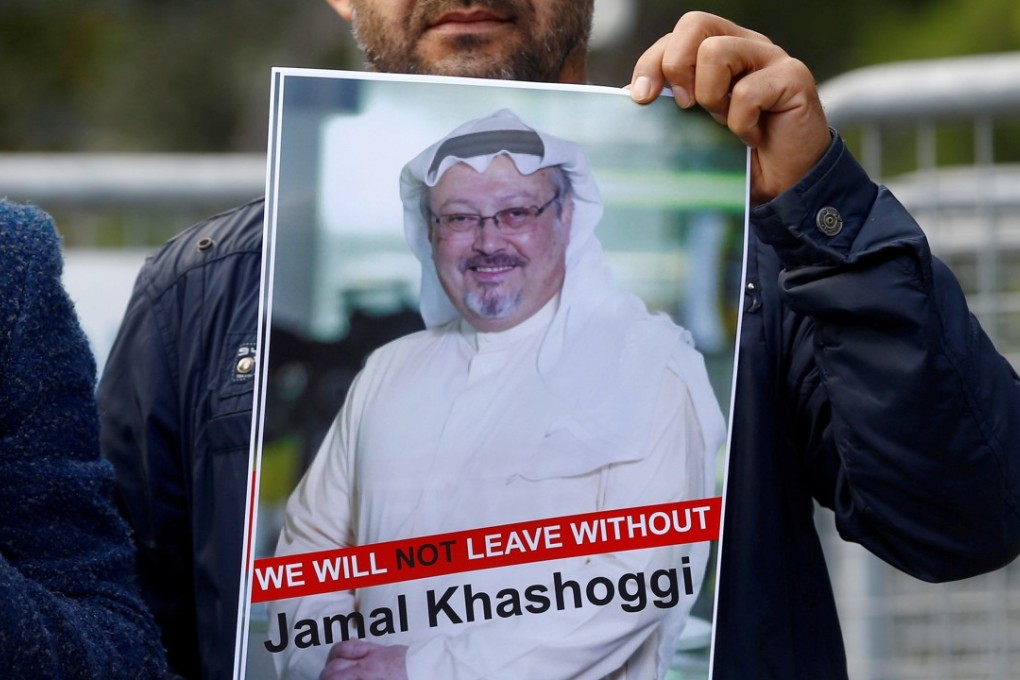 A demonstrator with a picture of Saudi journalist Jamal Khashoggi during a protest in front of Saudi Arabia's consulate in Istanbul, Turkey, on Friday. According to reports, Khashoggi, who is known for being a critic of his country's policies, has gone missing after visiting the consulate this month. Photo: Reuters
