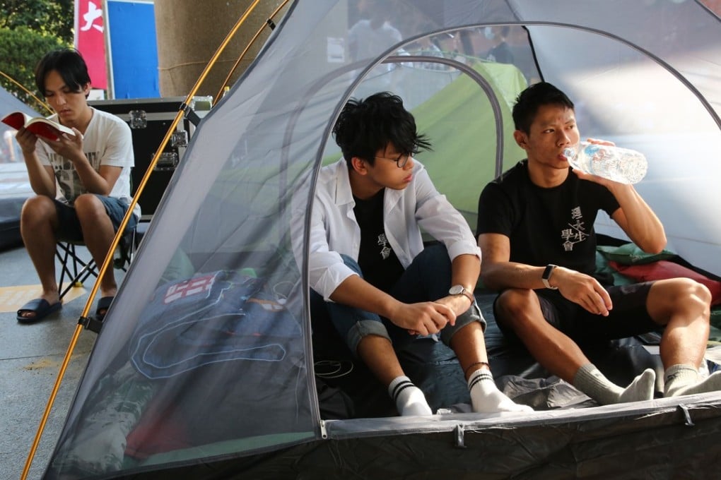 (Left to right) Hendrick Lui, Lam Wing-hang and Victor Yuen ended their hunger strike on Sunday. Photo: Edmond So