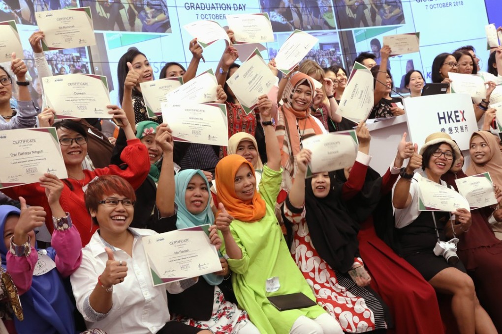 The graduation ceremony for 56 migrant domestic workers who completed the financial literacy programme. Photo: K.Y. Cheng