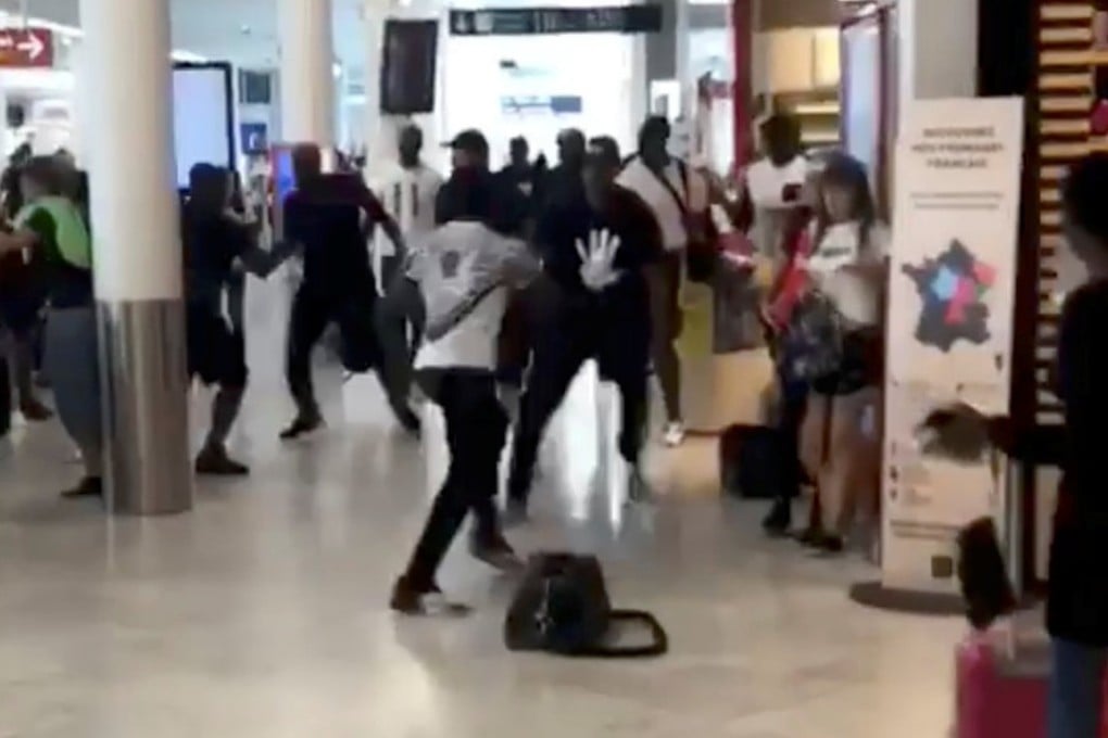 The brawl between rappers Booba and Kaaris in Orly Airport in Paris on August 1, 2018. Photo: Reuters/Rayane Mab