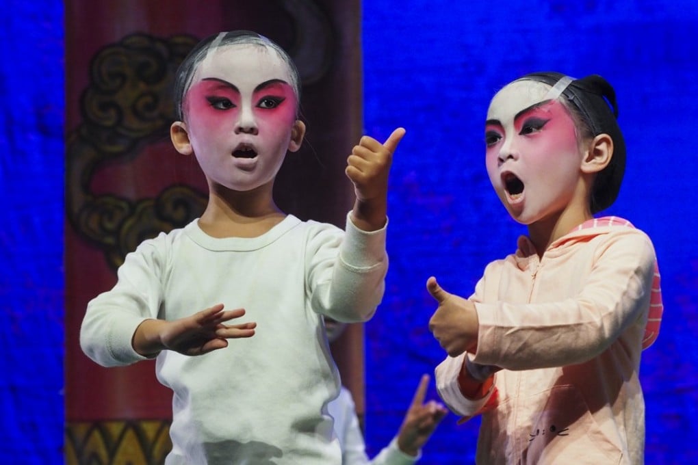 Young performers from Cha Duk Chang Children’s Cantonese Opera Association rehearse for their annual show, in Chai Wan on September 30. Speaking Cantonese is seen as an essential feature of the Hong Kong identity, and a focus on Mandarin can be perceived as “mainlandisation”. Photo: Martin Chan