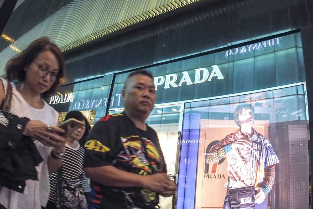 Mainland consumers outside the Prada Shop in Causeway Bay. Photo: Martin Chan