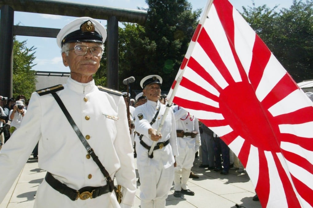 Japanese navy veterans march at the Yasukuni Shrine. Photo: Reuters