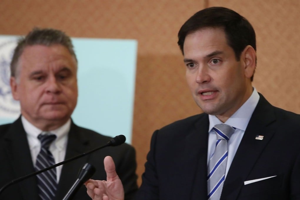 US senator Marco Rubio (right, with US congressman Chris Smith) at a news conference discussing the annual CECC report. Photo: Getty Images/AFP