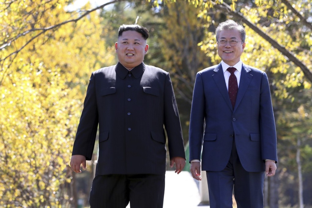 Moon Jae-in, right, walks with Kim Jong -un during their summit in North Korea last month. Photo: AP
