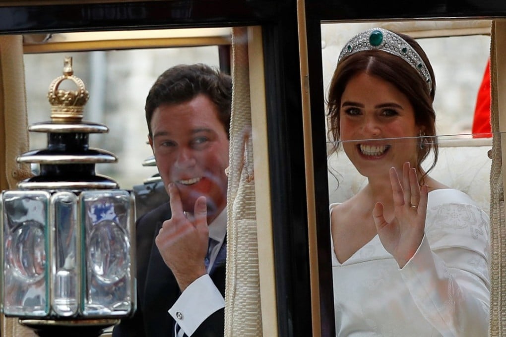 Britain's Princess Eugenie of York and her husband Jack Brooksbank leave in a carriage after their wedding ceremony at Windsor Castle. Photo: Reuters