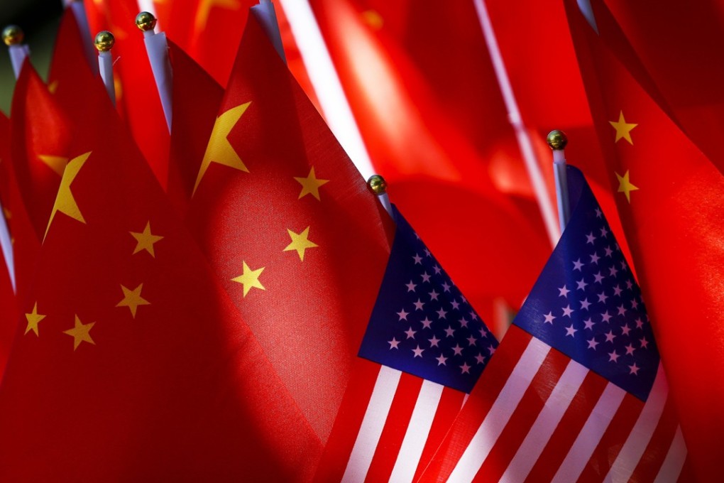 American and Chinese flags fly side by side in Beijing. Photo: AP