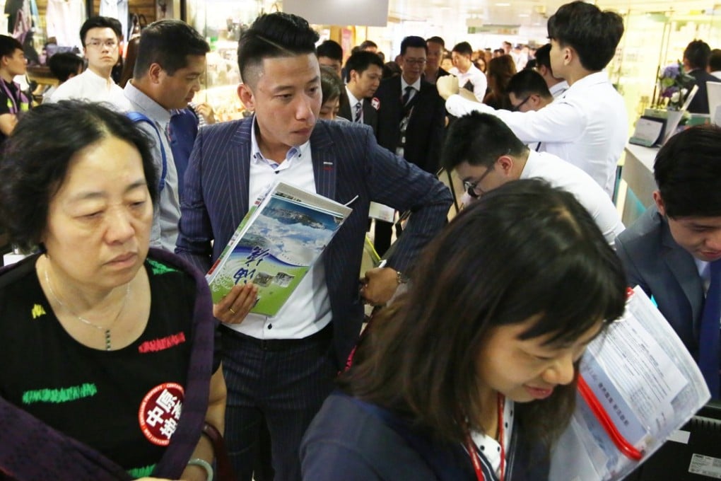 Prospective buyer line up at the sales office of One East Coast on October 12, the first project launch after Chief Executive Carrie Lam Cheng Yuet-ngor’s policy speech. Photo: Edmond So