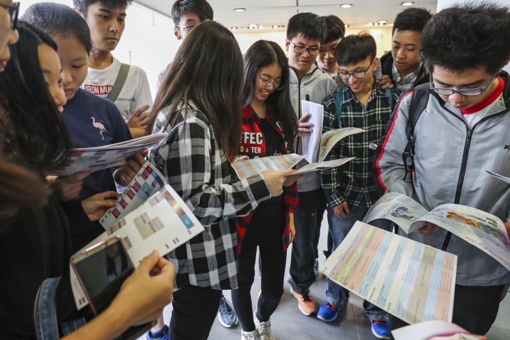 Secondary school students in Hong Kong attend a talk on the admission scheme changes at CityU. Photo: Edward Wong