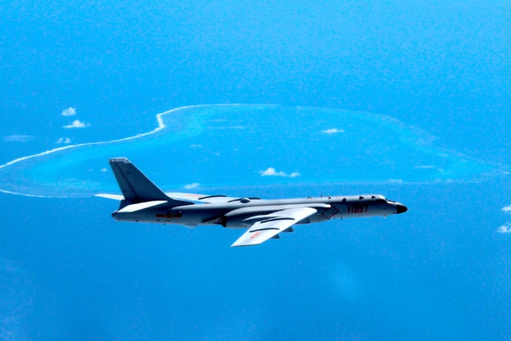 A Chinese H-6K bomber patrols the islands and reefs in the South China. Photo: AP