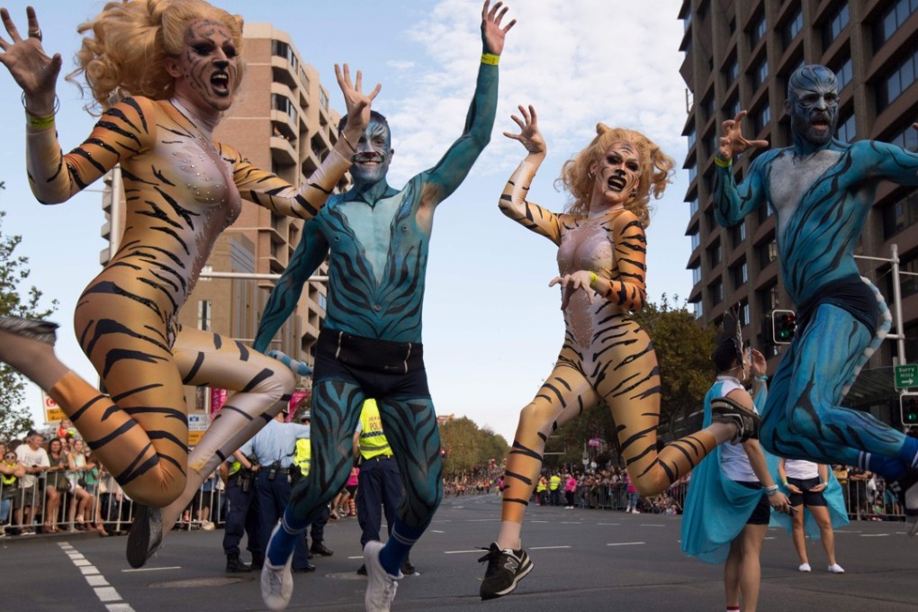 People take part in the Gay and Lesbian Mardi Gras parade in Sydney, Australia. Photo: AFP