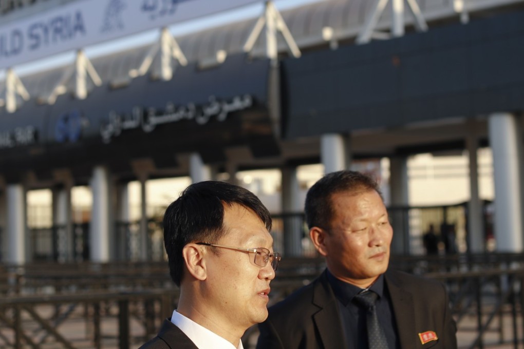 Chinese visitors at the Syria rebuilding conference earlier this month. Photo: AP
