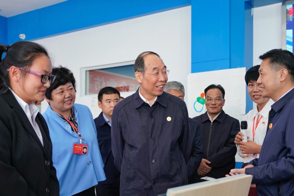 You Quan, Centre, head of the ruling Communist Party’s United Front Work Department, which oversees ethnic and religious affairs, visiting the Ningxia Institute of Science and Technology in Shizuishan City last month. Photo: Xinhua
