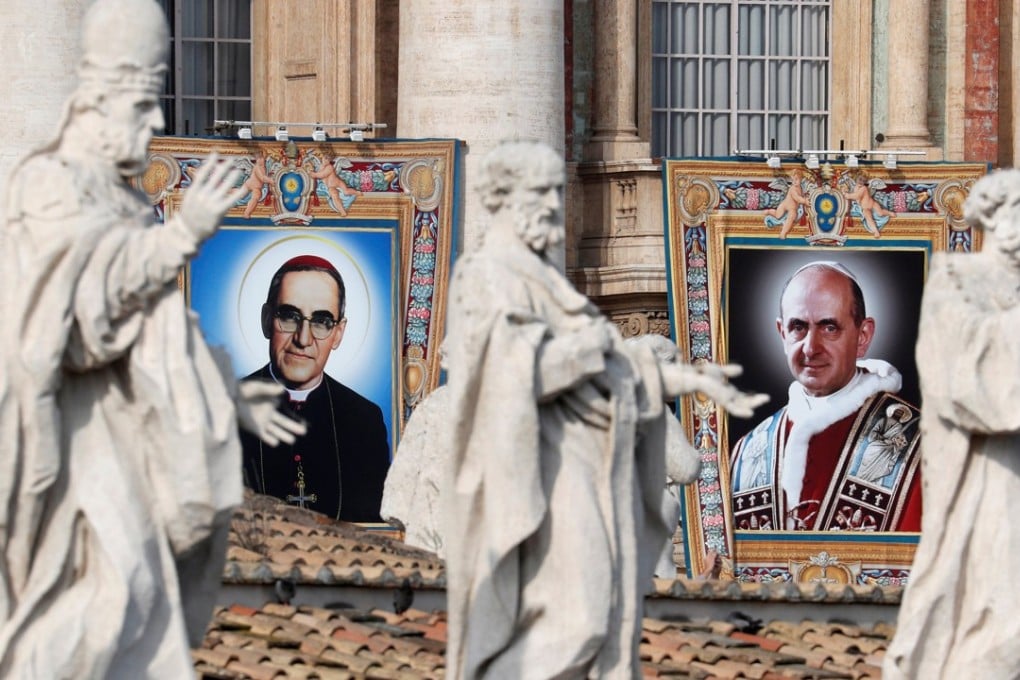Slain Salvadoran archbishop Oscar Romero and Pope Paul VI joined the church’s highest rank Sunday with an elevation to sainthood. Photo: Reuters