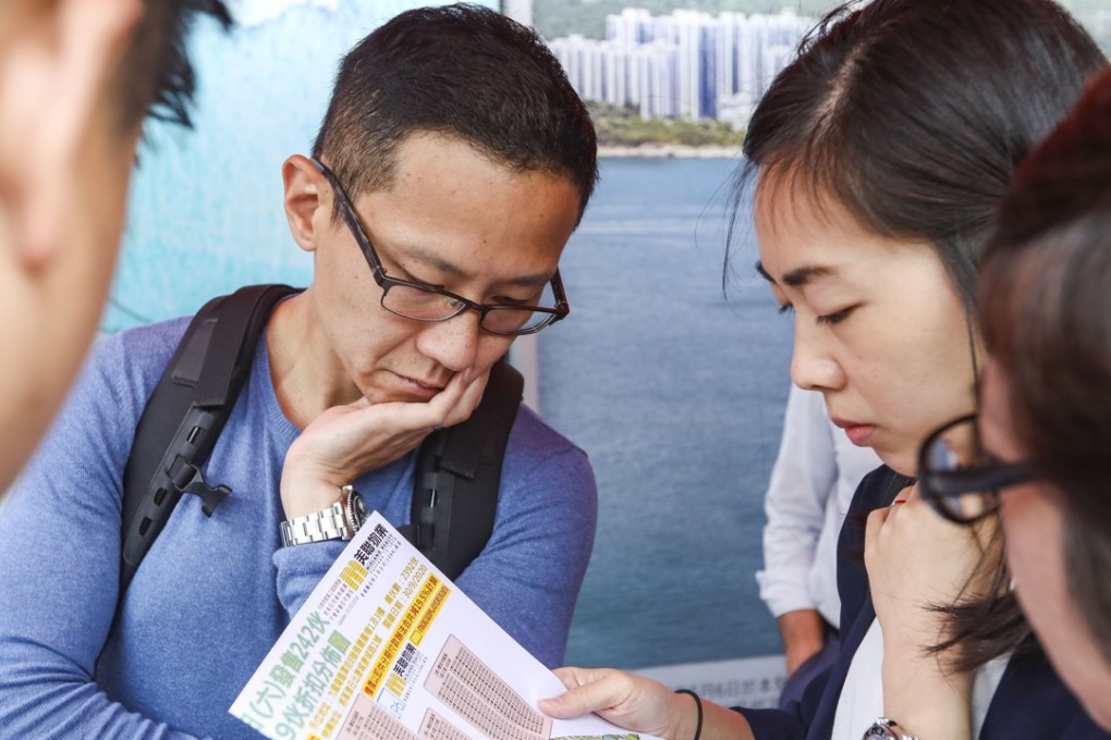 Prospective property buyers at the Octa Tower in Kowloon Bay, queuing up to bid for 491 units of LP6 at Lohas Park in Tseung Kwan O on 13 October, 2018. Photo SCMP / Xiaomei Chen