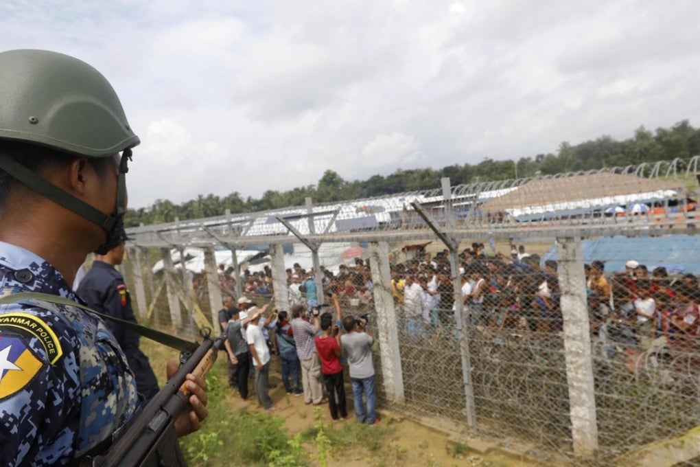 A Myanmar border guard watches the ‘no-man’s-land’ zone between Bangladesh and Myanmar in Rakhine State. Photo: EPA