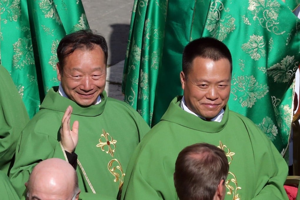 Chinese bishops John Baptist Yang Xiaoting and Joseph Guo Jincai attend a mass in Saint Peter's square on their first visit to Rome since the historic agreement between China and the Vatican. Photo: Reuters